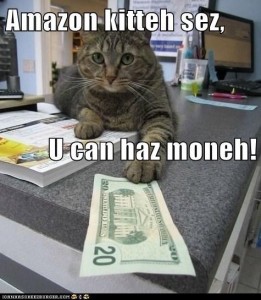 Amazon kitteh sez, U can haz moneh! (cat passing over a 20$ bill)